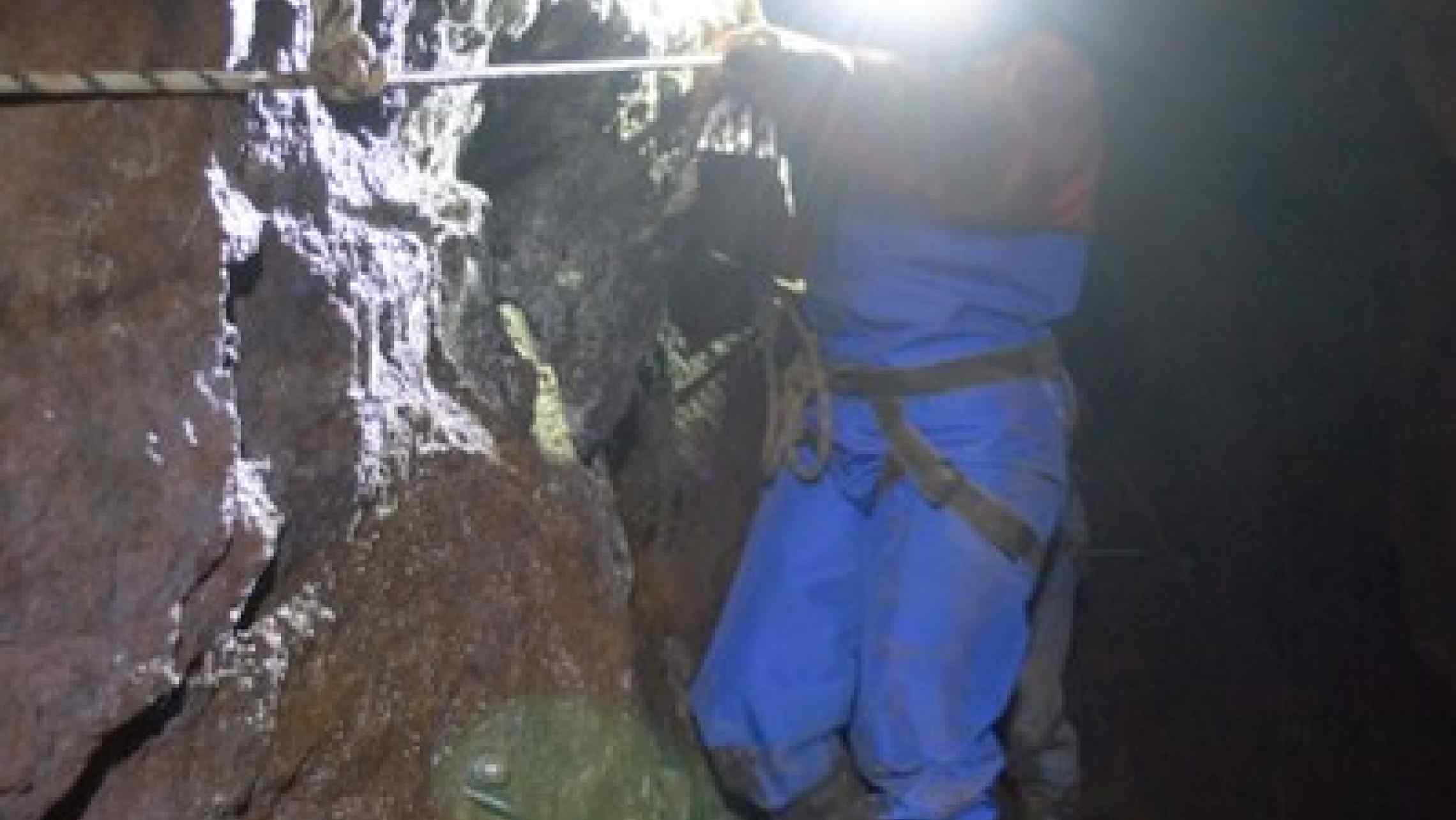 Exploring the dark underground spaces of a Cornish tine mine near St. Ives.