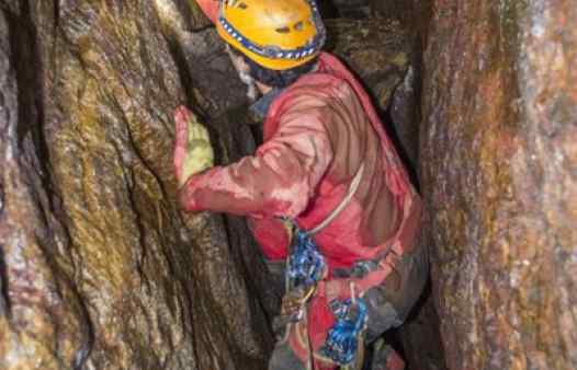 Mine guide drilling and bolting to create an adventurous mine tour. Join Cornwall Underground Adventures for Cornwall's most unique and thrilling day out.